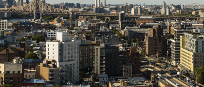 Traffic on Pulaski bridge in Long Island City. Panoramic view of Astoria, Roosevelt Island and Upper East Side Manhattan over the Queensboro Bridge.